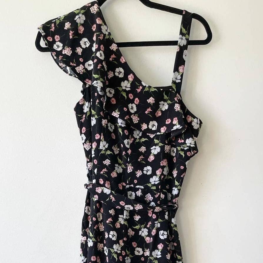 Gabby Skye Black Floral One Sleeve Ruffle Belted Jumpsuit