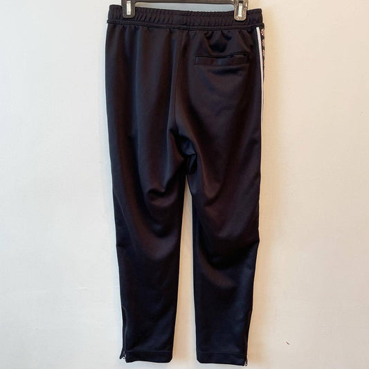 Nike Mens S Evolution of the Swoosh Jogger Track Pants Tribute Pinwheel Logo